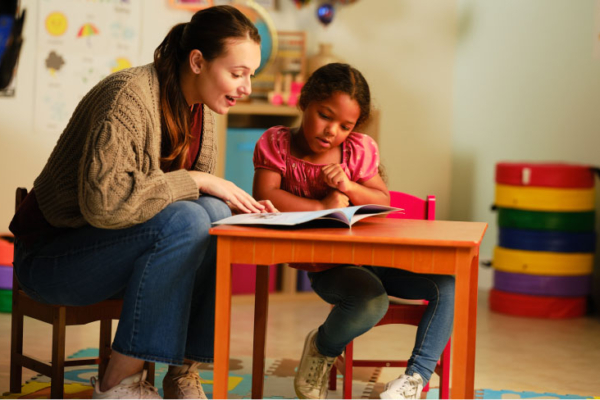 ph-child-teacher-desk